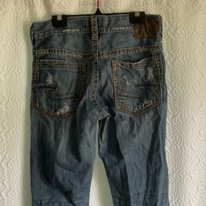 Silver Jeans Relaxed Blue Denim with Vintage distressed Fading